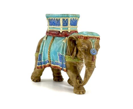 A Royal Worcester porcelain vase designed by James Hadley.  Modelled as an elephant with howdah. Impressed Worcester and diam