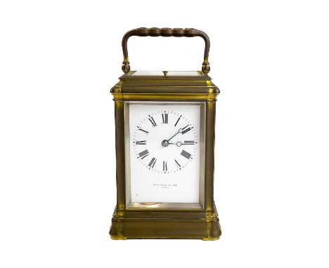A French repeater brass cased carriage clock retailed by Page, Keen &amp; Page, Paris. Late 19th century, the movement stampe