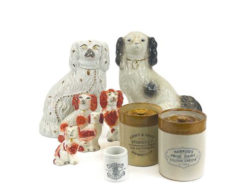 A collection of six assorted Victorian Staffordshire spaniel ornaments. Height 28cm diminishing, together with two stoneware 