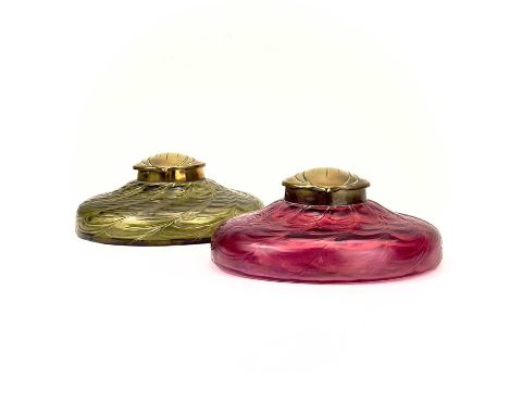 A circular ruby glass inkwell, probably Kralik. With a web of trailed decoration and embossed brass lid, height 6cm, diameter