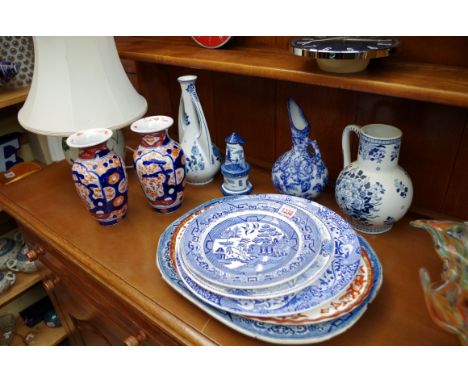 A mixed lot of pottery and porcelain; to include a Chinese famille verte lamp base. 