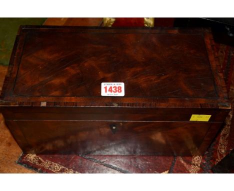 A George III mahogany and crossbanded tea caddy, 30.5cm wide. 
