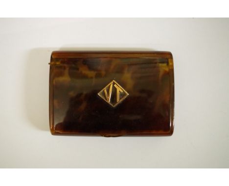 A tortoiseshell and gold mounted cigarette case, 8.5cm wide. 