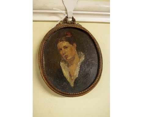 European School, late 19th/early 20th century, head and shoulders portrait of a lady, oil on card, 13 x 11cm, oval. 
