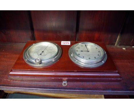 A 1930s combined timepiece and aneroid barometer set, the silvered dial inscribed 'Captain O M Watts Ltd, Made by Short & Mas