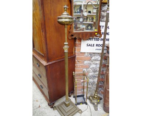 An old brass adjustable Corinthian column standard lamp, converted for electricity.