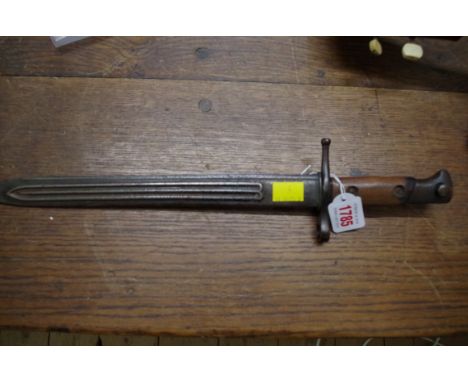 An Italian M1891 bayonet, stamped 'Torino', in scabbard, 