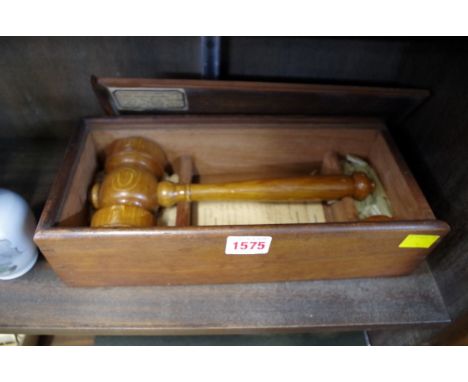 A Victorian mahogany cased hammer and chisel set used to launch 'HMS Pearl' in 1855, the lid bearing paper label inscribed 'h