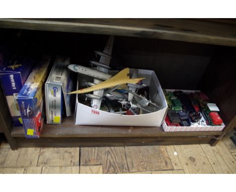 A small quantity of Corgi and similar model airplanes, to include a Concorde example; and a small quantity of diecast vehicle