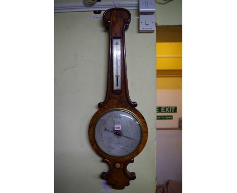 A Victorian walnut banjo barometer, the silvered dial inscribed 'Cromey, Bristol'.