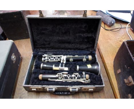 A Buisson 'Perfection' clarinet, in fitted case. 