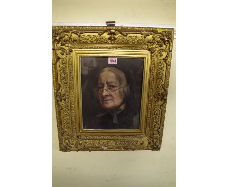 English School, 19th century, head and shoulders portrait of an elderly lady wearing a lace bonnet, oil on canvas, 27.5 x 22.