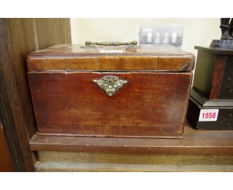 An 18th century walnut and crossbanded tea caddy, 24.5cm wide. 