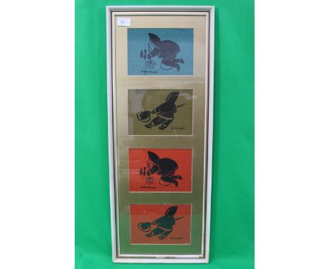An Inuit framed and glazed print on tapestry. see illustration singed Ohuveluk. Measure:78cms x 31cms.