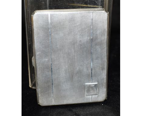 A SILVER CIGARETTE CASE  With engine turned design and small blank square cartouche, hallmarked for Birmingham, date letter P