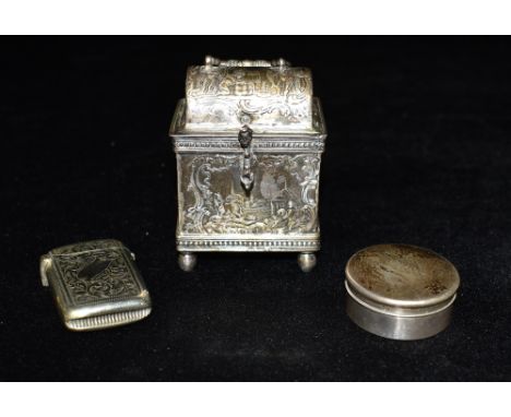 A SMALL CONTINENTAL SILVER/WHITE METAL CADDY  on four ball feet, standing approx. 8.5cm high, some markings to the base, toge