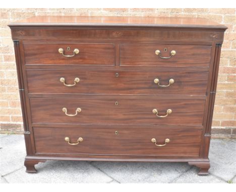GEORGIAN MAHOGANY CHEST OF TWO SHORT OVER THREE LONG GRADUATING DRAWERS, having a secret drawer to the top left hand corner a