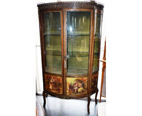 A VERNIS MARTIN STYLE BOWFRONTED DISPLAY CABINET, the top having a brass galleried back, with metal decoration to the top, si