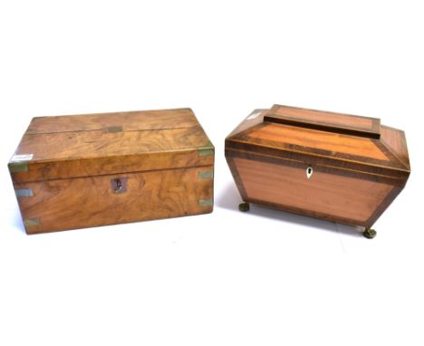 A VICTORIAN SARCOPHAGUS SHAPED CADDY  on four brass feet, 31cm wide; and brass bound walnut writing slope