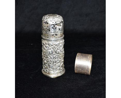 A SILVER SUGAR CASTER with heavy embossed floral scroll, hallmarked London, date letter P, weighing approx. 111.9grams, some 