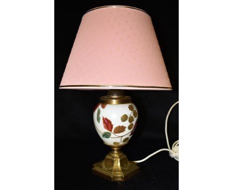 A ROYAL WORCESTER STYLE TABLE LAMP  the ceramic body with gilded and painted decoration of blackberries on a branch, on squar