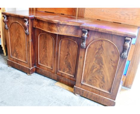 VICTORIAN MAHOGANY SIDE CABINET, the central section having a pair of twin doors opening to reveal a fitted shelf, flanked by