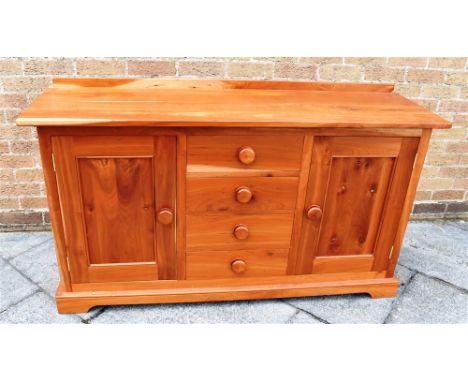 A FRUITWOOD DRESSER BASE, with four central drawers, each flanked by a cupboard with a fitted shelf, H 85.5cm x W 152cm x D 4