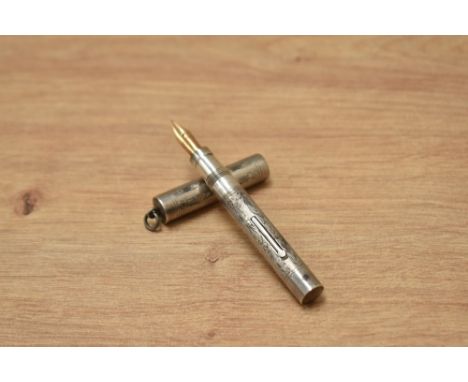 A Mabie Todd &amp; Co sterling silver lever fill fountain pen with snail chase design and ring top cap having Mabie Todd &amp