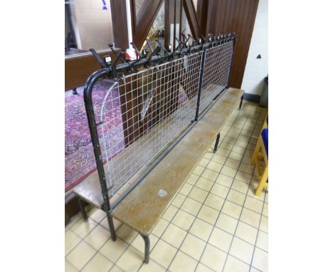 A PAINTED TUBULAR SCHOOL CLOAK ROOM DOUBLE SIDED TWENTY HOOK COAT RACK, each hook numbered with wooden seats attached to both