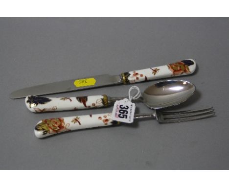 A THREE PIECE COALPORT CUTLERY SET, to include knife, fork and spoon