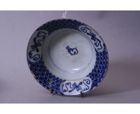 A BLUE AND WHITE ORIENTAL POTTERY BOWL, Rabbit pattern, (shipwreck salvaged item ?), diameter approximately 16.5cm