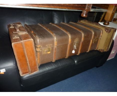 A TRAVELLING TRUNK, two suitcases and a tin trunk (4)