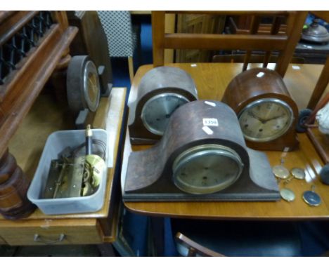 THREE OAK CASED MANTLE CLOCKS, another clock, a box of clock parts and a wall mirror