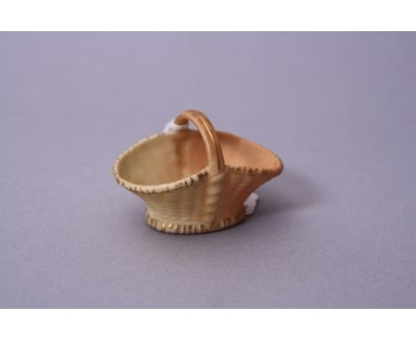 A MINIATURE ROYAL WORCESTER BASKET, puce backstamp