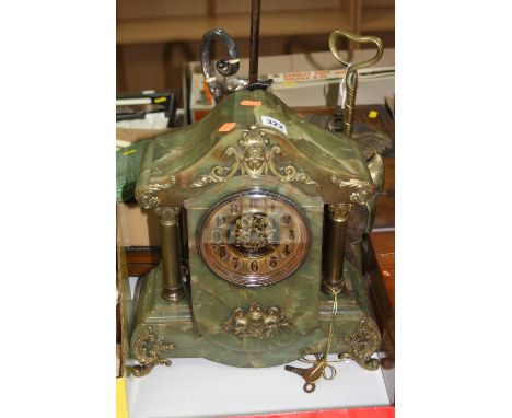 AN ONYX AND GILT/BRASS MOUNTED MANTLE CLOCK, with four corinthian columns (key and pendulum) 