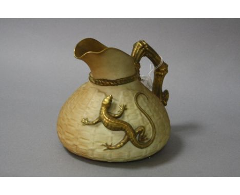 A ROYAL WORCESTER BLUSH IVORY JUG, with gilt branch handle and mounted with a gilt Lizard, shape No.1714, height approximatel