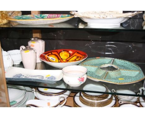 SIX PIECES OF POOLE POTTERY, to include a 'Delphis' bowl, shape No.57 etc