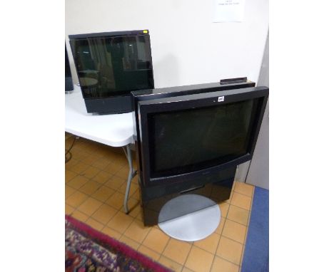 A BANG AND OLUFSEN BEOVISION AVANT 100H2 TV, type 8323, item no 1833768  with remote and a Bang and Oulfsen Beovision MXQ002 