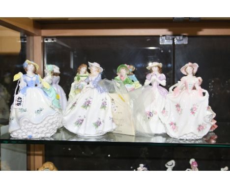 A SET OF TWELVE ROYAL WORCESTER LIMITED EDITION FIGURES, 'Sweet Daisy', 'Snowdrop', 'Astor', 'Daffodil', 'Rose', 'Holly', 'Pe