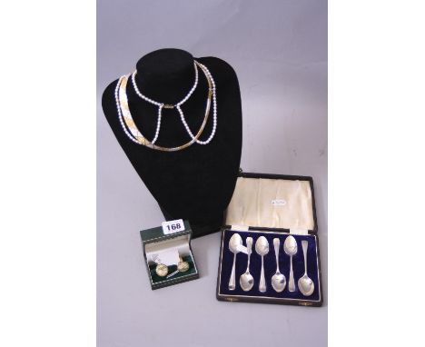 A JAGUAR SILVER GILT AND ENAMEL CUFFLINKS, in the form of car speedometers, boxed silver teaspoons (5 + 1  non matching spoon