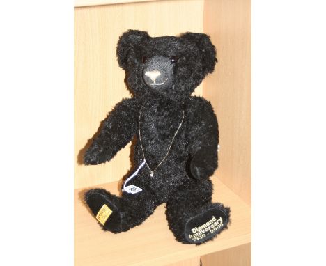 A BOXED MERRYTHOUGHT DIAMOND ANNIVERSARY 1930-2005 COLLECTORS BEAR, No.18 of 750, complete with certificate and necklace