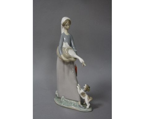 A LLADRO FIGURE GROUP, girl carrying duck in basket