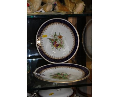 A PAIR OF ROYAL WORCESTER DESSERT PLATES, florally decorated, diameter approximately 23cm (2)