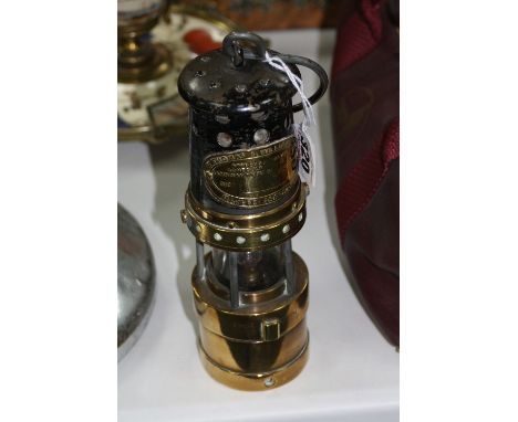 A 'E. THOMAS & WILLIAMS LTD' MINERS LAMP
