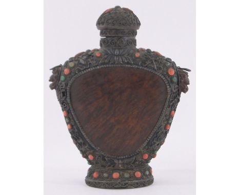 A 19th century Chinese carved wood silver and stone set flask,relief embossed floral decorated silver mounts allover, set wit