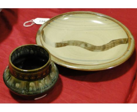 A Linthorpe pottery vase designed by Christopher Dresser,height 7cm and a St. Ives Leach Pottery plate with brush work decora