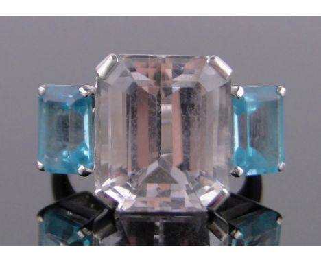 A large 18ct white gold 3 stone kunzite and aquamarine set ring,setting width 22mm, size M.