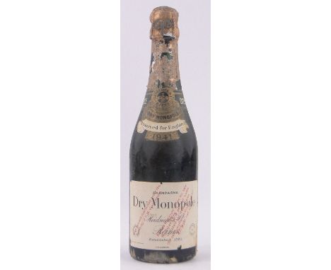 1/2 bottle of Heidsieck Dry Monopole Champagne, Vintage 1941. Rare bottle of wartime vintage with H.M. Government import stam