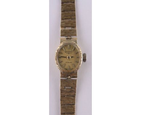 A lady's 9ct gold cased Rotary mechanical wristwatch,17 jewel movement with 9ct textured strap, case width 14mm.