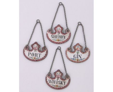 A set of 4 Georgian hand painted enamel decanter labels,width 5cm.